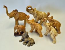 7x Assorted Elephant Statues/Ornaments various shapes and sizes, coffee coloured, a wooden figure on