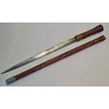 Somali Sword Stick measures 60cm approx., with blade measuring 35cm approx. wood and decorated