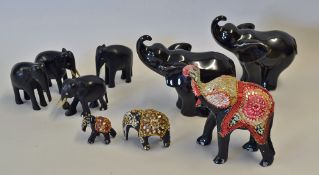 Selection of Elephant Ornaments to include a trio of wooden bejewelled elephants, a pair of