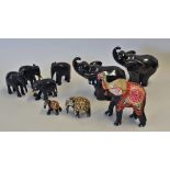 Selection of Elephant Ornaments to include a trio of wooden bejewelled elephants, a pair of