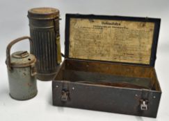 A WWII German vehicle first aid metal box, winter help collecting tin, belt and a gas mask canister.