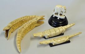 Selection of Carved bone items includes a pair of crocodiles appear hand carved measure18cm in