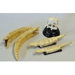 Selection of Carved bone items includes a pair of crocodiles appear hand carved measure18cm in