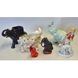 Assorted Selection of Elephant Statues and Ornaments including plant Pots, a Cuddling Elephant