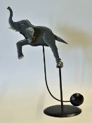 Interesting Metal Rocking Elephant and Stand measures 46cm height, perfectly balanced designed to