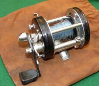 REEL: Abu Ambassadeur 6000C multiplier reel, 3 screw black grooved end plates, foot stamp 117100,