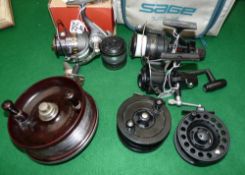 REELS: (6) Shimano SS 64000 rear drag spinning reel, on/off check,, screw fold handle, c/w spare