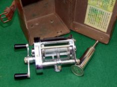 REEL & OIL BOTTLE: (2) Fine Hardy Elarex bait casting multiplier reel in as new condition, brake/