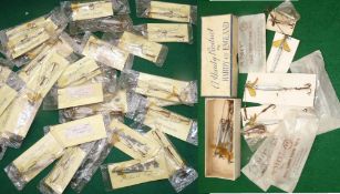 LURES: Collection of 32 Hardy prawn and natural bait tackle mounts, all on maker's yellow cards