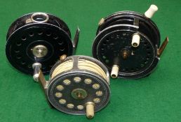 REELS: (3) Three JW Young pattern vintage reels, a 3.5" pattern 9 style drum casting reel, factory