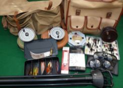 ACCESSORIES: A pair of traditional canvass and leather multi pocket tackle bags containing game