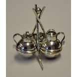 Fine silver plated golfing cruet set stand comprising 3 crossed golf clubs and guttie golf ball