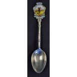 Silver and Enamel Golf Spoon depicting enamel golfing figure with NWGC appears in good condition