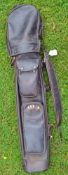 Fine McAllister leather oval golf bag c/w detacheable travel hood, and two good size pockets and