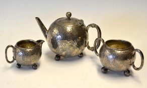 Silver plated dimple golf ball tea set - comprising tea pot, sugar and cream depicting golf balls to