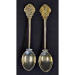 2x Silver Golfing Spoons both depicting a golfer in swing pose 1921 and 1932 unnamed, wt 2oz -