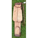 A good leather and canvas oval shaped golf bag c/w folding travel hood/pocket and ball pocket fitted