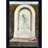 Young "Tommy" Morris colour postcard - titled "Tom Morris' Tomb, St Andrews" issued by W & A.K