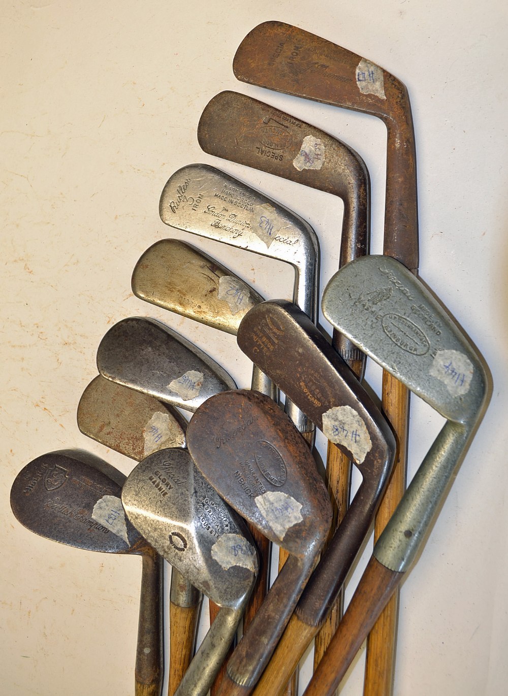 11x various irons and putters - all in need of restoration, to incl 9x irons notable makers