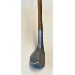A G Spalding & Co London alloy wood - short lofted baffie with the original leather grip with