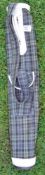 Tartan canvas pencil golf bag c/w ball pocket, matching shoulder strap and a good leather base
