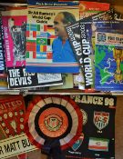 An 'Aladdin's Cave' of Manchester United football programmes and memorabilia with posters, pennants,