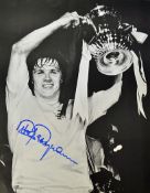 Steve Perryman Signed Football Print a black and white print depicting Perryman holding the 1982