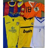 Selection of Junior Football Shirts includes Barcelona, Holland, Leeds, Holland, Leeds United,