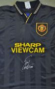 Eric Cantona Signed Manchester United Football Shirt a black away replica shirt, short sleeve,