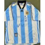 1990 Argentina international shirt with signatures of seven players. Given to the vendor by the