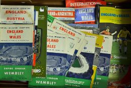 Selection of England international home football programmes to include 1954 Wales 1956 Brazil,