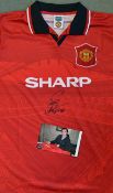 Eric Cantona Signed Manchester United Football Shirt a red short sleeve, replica shirt signed to the