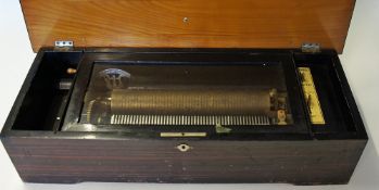 Early Cylinder Music Box marked 'made in Switzerland' in working order, requires some light