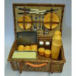 Picnic Set in Wicker Basket comes with 2x Thermos (1925) flasks, 4x Piece Cutlery set, 2x Glass