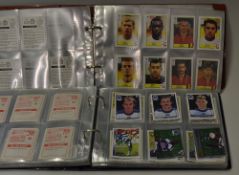 Selection of Football Cards in 2 Albums containing Barratt World Heroes, World Star Series, Merlin