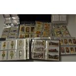 Selection of Cigarette and Tea Cards - in 7 Albums containing full sets Grandee, Wills, Castella,