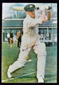 Don Bradman Signed Cricket Print signed to the front in ink, depicts a batting posed Bradman, in