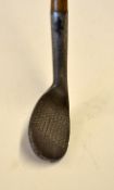 Gourlay concaved face mashie niblick with square pattern central drilled face markings and stamped