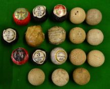 Collection of various wrapped and used golf balls to incl"Flights Fancy" square mesh paper wrapped