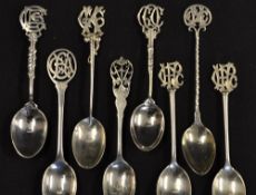 8x assorted ornate Golf Club silver teaspoons with skeleton finials - some with golf club stems