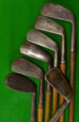 7x assorted irons incl Spalding driving iron stamped J.B Jolly Royal Guernsey GC, Spieler mid