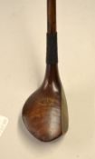 Gibson of Kinghorn elongated oval headed spoon with full brass sole plate showing the maker's mark