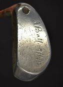 An historically unique aluminium mallet head putter (stamped Jack Ross-Newport. 1) showing an