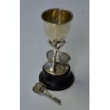 Miniature Silver Tennis Trophy dated 1927 at 12cm in height, the cup is supported by three