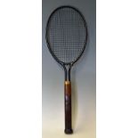 Dayton Steel Tennis Racket stamped 'Dayton' to the brass collar, a wooden handled racket with