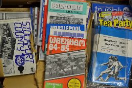 Quantity of Stockport County home and away programmes covering 1970s and 1980s, condition varies but