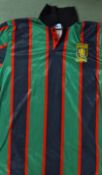 1993/95 Aston Villa No9 away football shirt a green, black and red short sleeve shirt with no9 to