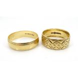 TWO NINE CARAT GOLD WEDDING BANDS one with engraved decoration, ring size P, approximately 3.