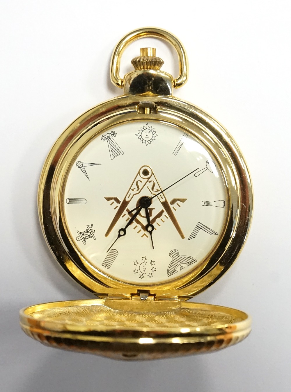 MASONIC HUNTER POCKET WATCH the gilt brass case decorated with the compass and set square,