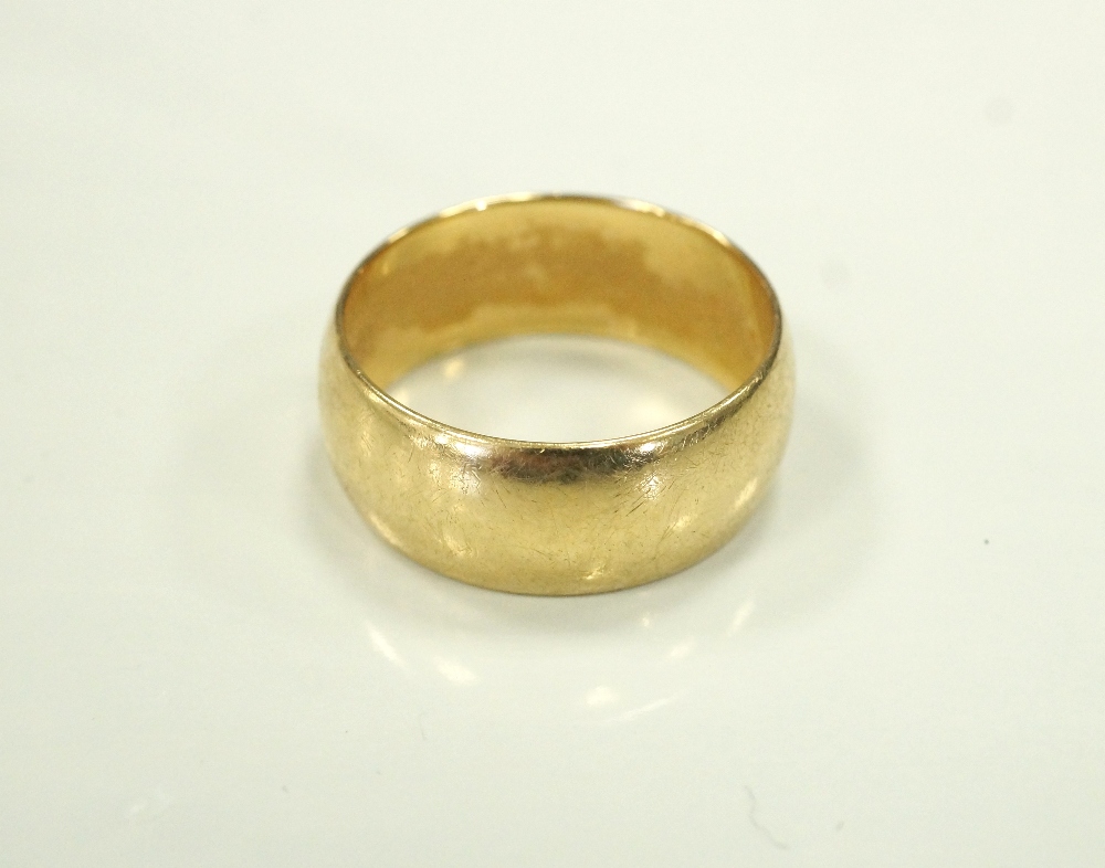 NINE CARAT GOLD WEDDING BAND ring size T and approximately 7.